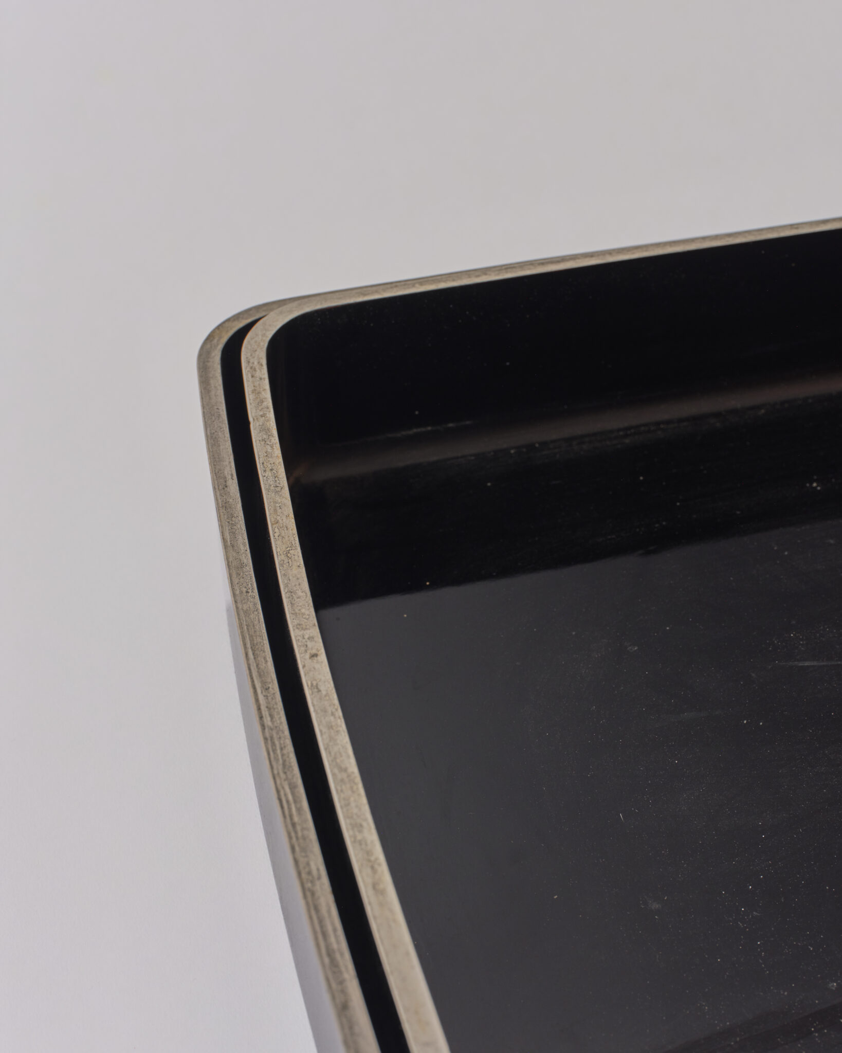 Pair of Japanese Lacquer Nesting Trays with Silver Rims