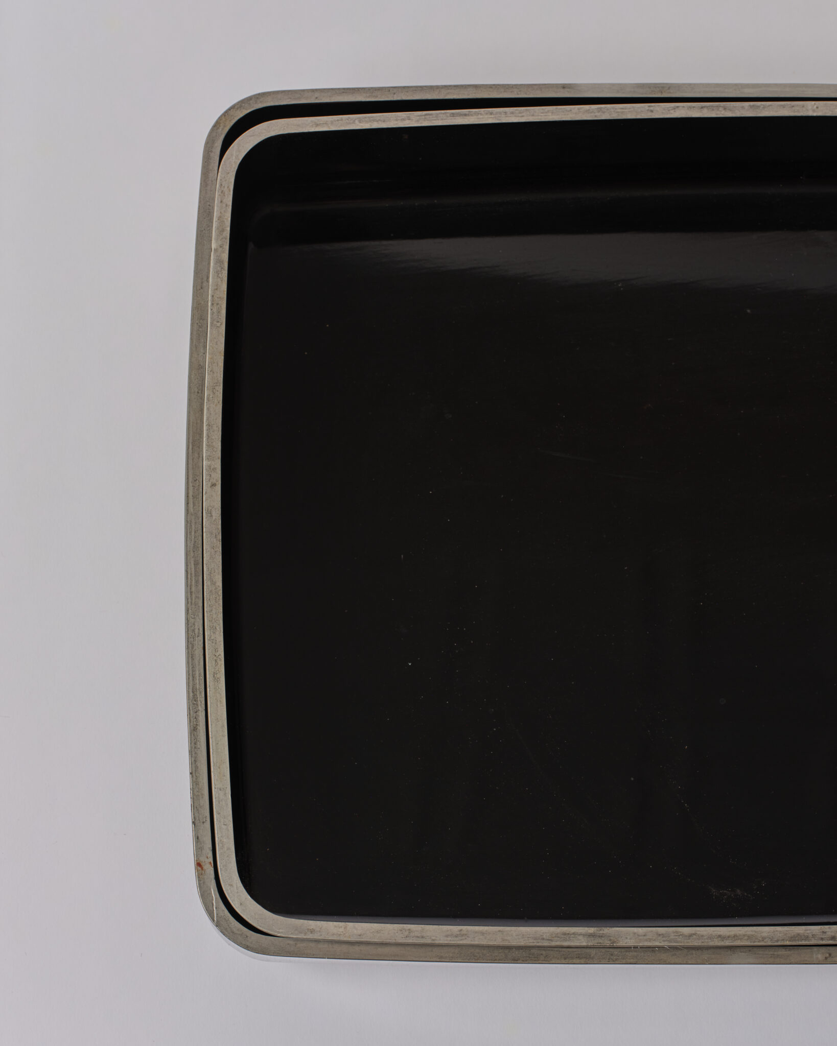Pair of Japanese Lacquer Nesting Trays with Silver Rims